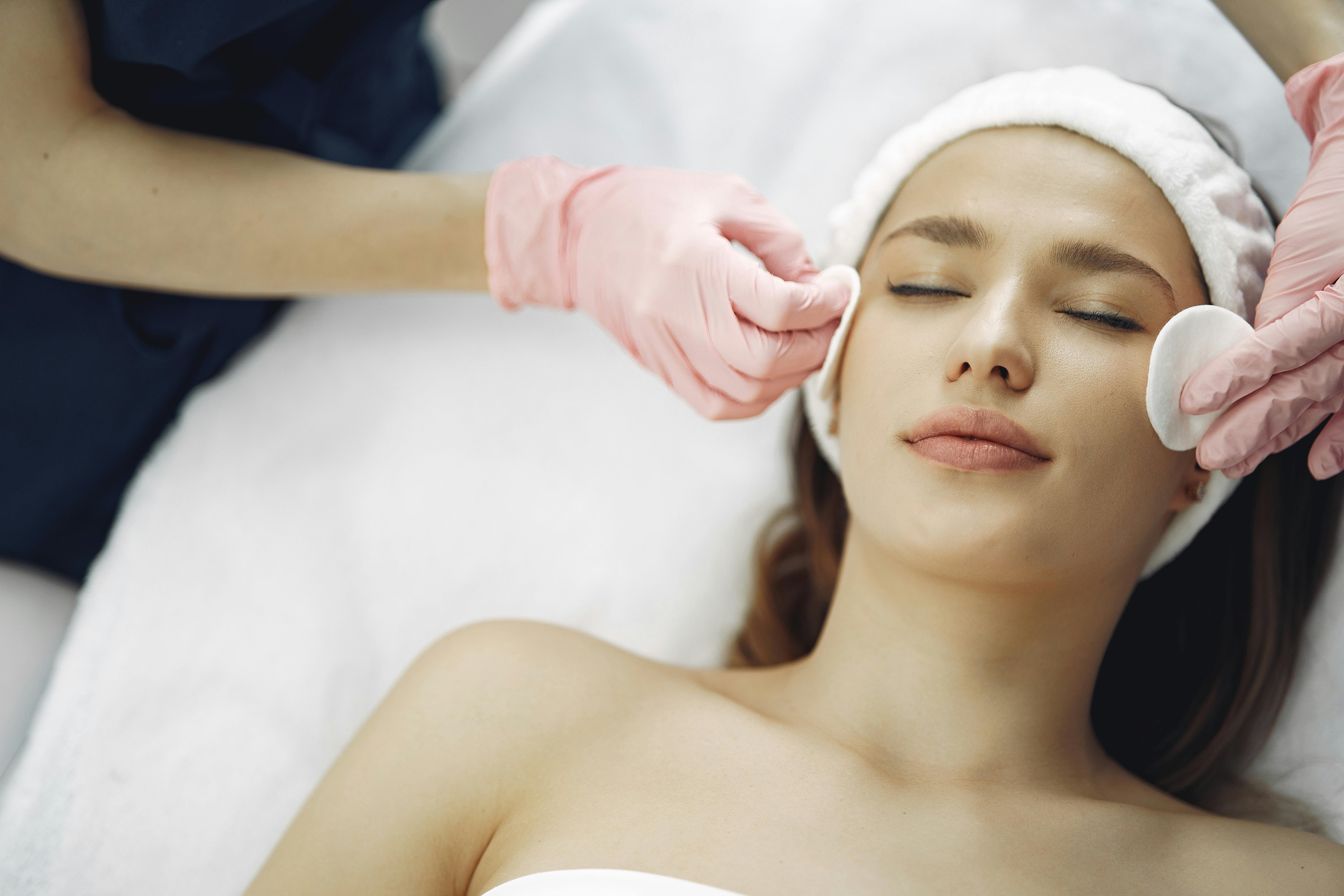 A practitioner preparing a thread vein treatment at Wilbury Clinic